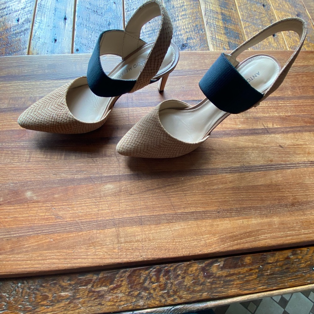 Antonio Melani pumps faux reptile leather tops and stretchy black strap.